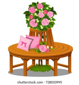 Wooden round bench around shrub with rose flowers and soft pink pillows isolated on white background. Beautiful idea landscape design of botanical garden or park. Vector cartoon close-up illustration.