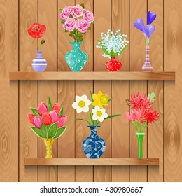 Wooden shelves  with collection of modern vases with lovely flowers for your design