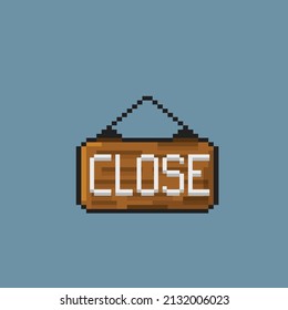 wooden sign with close text in pixel style