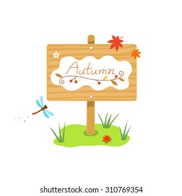 Wooden sign on a grass with  Maple Leafs  and Dragonfly