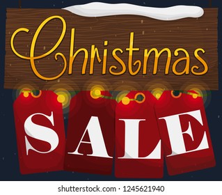 Wooden sign with some of snow, decorated with red tags and Xmas lights promoting Christmas sales.