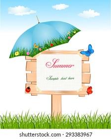 Wooden summer signboard with umbrella and butterflies between grass and sky