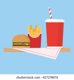 Wooden table with table cloth and fast food
