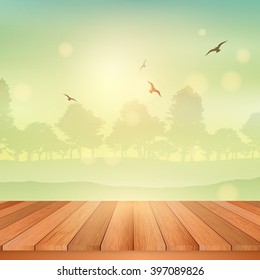 Wooden table looking out to a view of a sunny landscape