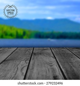 Wooden table, on blur background Nature summer, spring. It can be used for the presentation of the goods