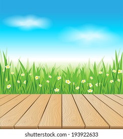 Wooden table on spring meadow background vector