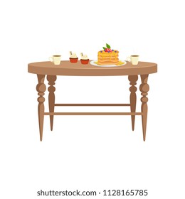 Wooden table with two cups of tea, cupcakes and stack of pancakes with berries on a plate, food for breakfast vector Illustration on a white background