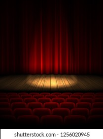 Wooden theater  stage, illuminated by a searchlight on the background of a red curtain.