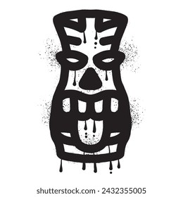 Wooden tiki mask graffiti with black spray paint art