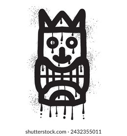 Wooden tiki mask graffiti with black spray paint art