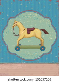 Wooden toy horse on wheels over vintage background