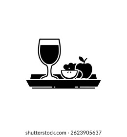 Wooden tray with juice glass and fruit icon in black design