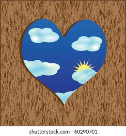 Wooden wall with a hole in heart shape