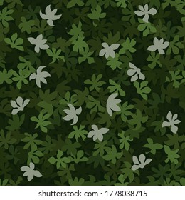 Woodland camouflage pattern background seamless vector illustration. Classic clothing style masking camo repeat print. Green colors forest texture