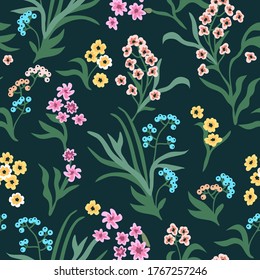Woodland flowers on black background. Vintage print with small inflorescences. Seamless vector pattern. Retro textile collection. 
