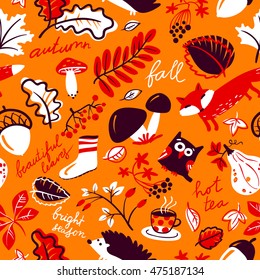 Woodland wild animals and autumn season nature plants seamless pattern. Fall vector background with fox, owl, hedgehog, mushroom, rowan, acorn, grape, leaf, tea cup