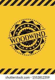 Woodwind black grunge emblem, yellow warning sign. Vector Illustration. Detailed.