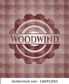 Woodwind red emblem or badge with abstract geometric pattern background. Seamless.