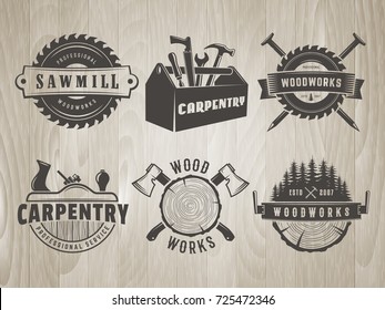 Woodwork logos. Vector badges for carpentry, sawmill, lumberjack service or woodwork shop. Set of hand tools labels on vintage wooden background.