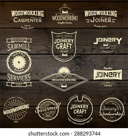  Woodworking badges logos and labels for any use. On wooden background texture