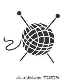 Wool clew with knitting needles glyph icon. Silhouette symbol. Yarn ball. Negative space. Vector isolated illustration