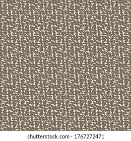 Wool rug with chevron texture. Brown mottled background with less clear geometric elements.
