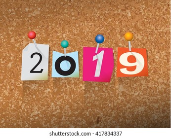 The word "2019" written in cut ransom note style paper letters and pinned to a cork bulletin board. Vector EPS 10 illustration available.