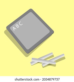 The word ABC is written on a small blackboard with three white pencil attached to it