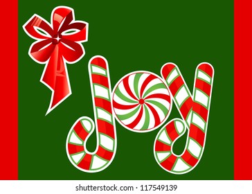 Word JOY made of candycanes - copyspace