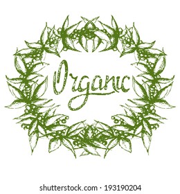 word "organic" in a wreath of leaves and berries. Vectorized hand drawing