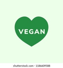A palavra vegan em um vetor de forma de coração