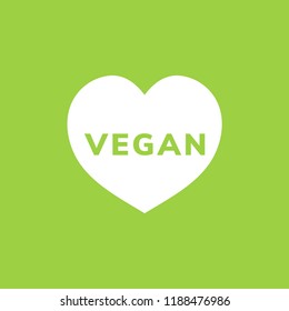 La palabra vegana en un vector de forma cardíaca