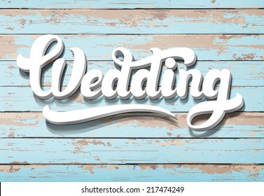 The word Wedding on a wooden background. Horizontal boards 