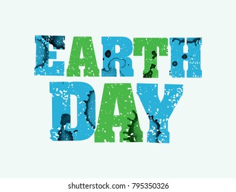 The words EARTH DAY concept printed in letterpress hand stamped colorful grunge paint and ink. Vector EPS 10 available.