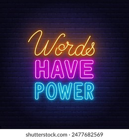 Words Have Power neon lettering on brick wall background