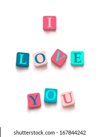 Words "i love you" with colorful blocks isolated on a white background. Description with bright cubes. Valentine's day card. Vector illustration EPS 10.