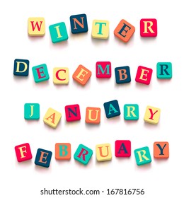 Words "winter", "february", "january", "december" ; with colorful blocks isolated on a white background. Descriptions with bright cubes. Vector illustration EPS 10.