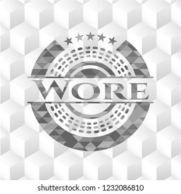 Wore grey badge with geometric cube white background