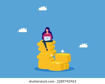 Work to build wealth. woman working with laptop on stack of money
