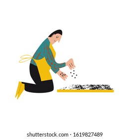 Work in a garden. A man in a yellow garden apron and checked shirt transplants the seedlings. A person takes care about plants in a garden. Planting, growing and gardening concept. Flat vector 
