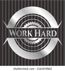 Work Hard silver emblem or badge