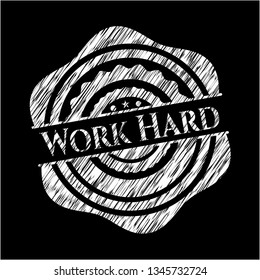 Work Hard written on a blackboard