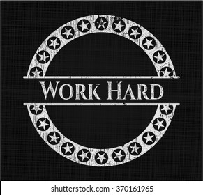 Work Hard written on a blackboard