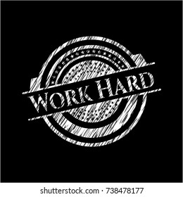 Work Hard written on a blackboard