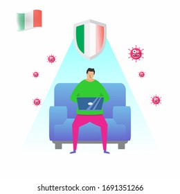 Work from home during the COVID-19 virus outbreak. People work at home to prevent viral infections. an Italian man sitting on a sofa and working on a laptop at home. stay home and stay healthy.