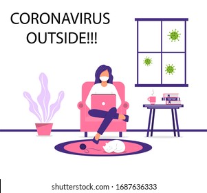 Work at home during an outbreak of the COVID-19 virus. People work at home to prevent a viral infection. Masked woman works on laptop at home sitting in armchair. Coronavirus quarantine concept.