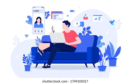 Work from home video chat - Man sitting in couch with laptop chatting with colleague on phone. Various work design elements in background. Virtual meeting, online chatting, and home office concept.