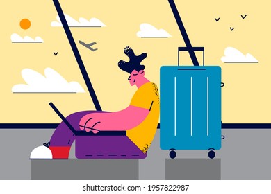 Work online remote and freelance concept. Young positive man with suit working and typing on laptop sitting on the floor at airport vector illustration 