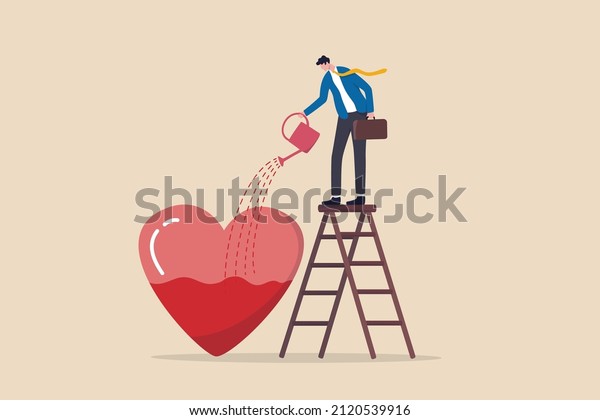 Work passion, motivation to success and win\
business competition, mindset or attitude to work in we love to do\
concept, businessman pouring water to fulfill heart shape metaphor\
of passion.