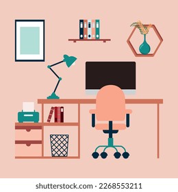 Work place. A desk with a computer and a book holder in nude color